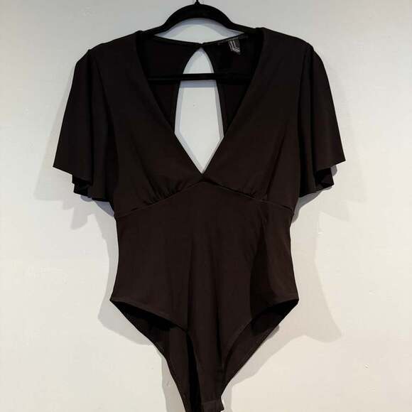 Free People "Va Va Voop" Deep V-Neck Batwing Sleeve Bodysuit in Black - Picture 1 of 2